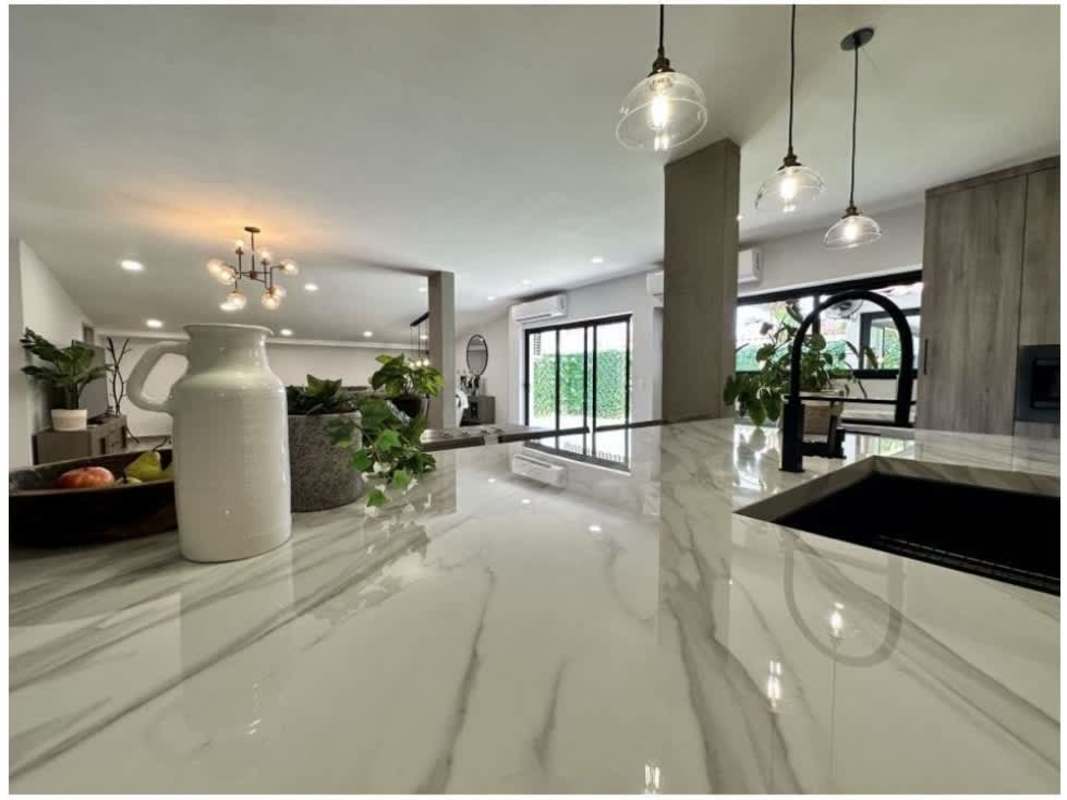 Spacious living room with sectional sofa, recessed lighting PH Quintas de Versalles Costa Sur