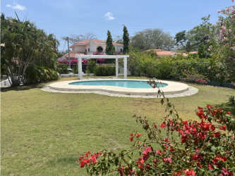 Modern kitchen with granite countertops wooden cabinetry appliances Coronado Golf Panama