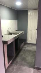 Minimalist concrete kitchenette in apartment for rent Veracruz Panama