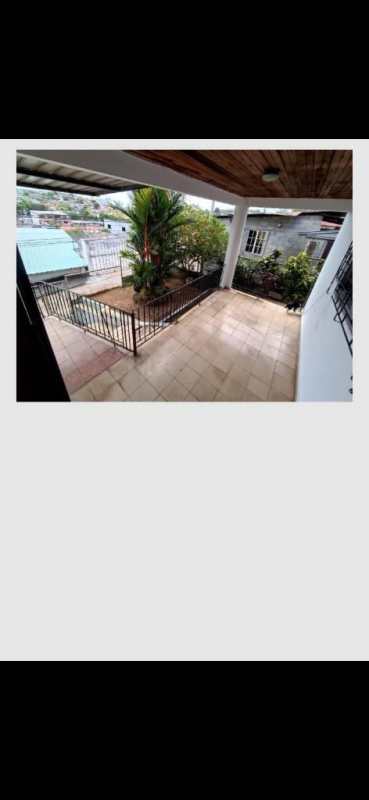 L-shaped kitchen with red cabinets, dining area, Paraíso San Miguelito Panama