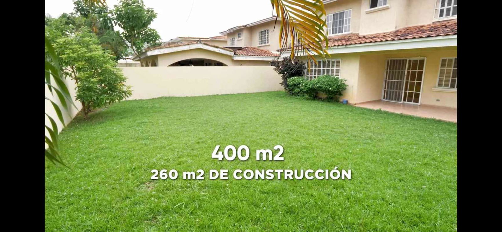 Large green lawn with landscaped backyard and terrace in Albrook house for rent