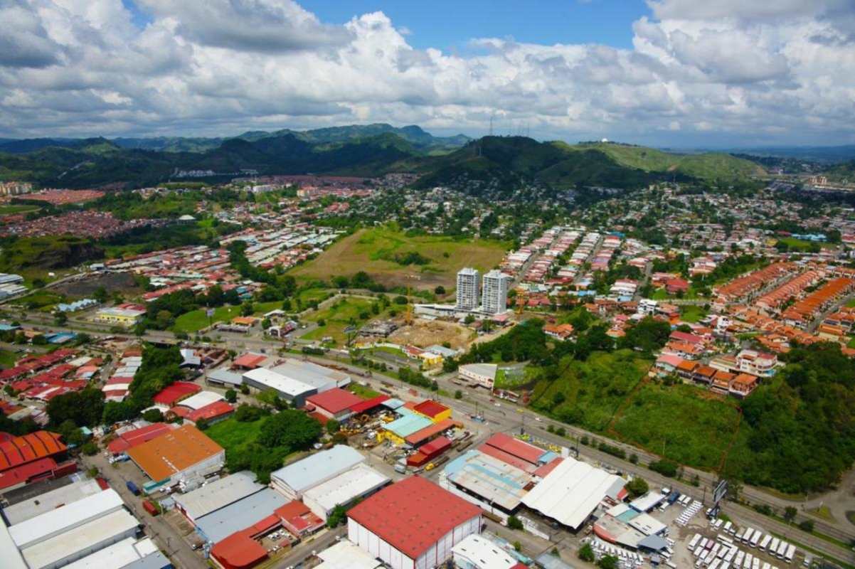 Aerial perspective mixed residential, industrial and green hills nearby Panama City land in Tumba Muerto