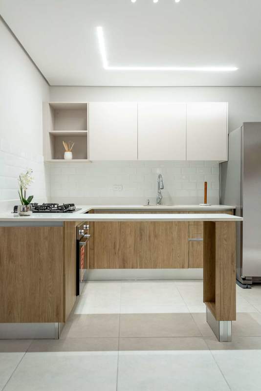 Bathroom with glass shower enclosure, vanity, mirror and modern tiles in PH Mi Condado