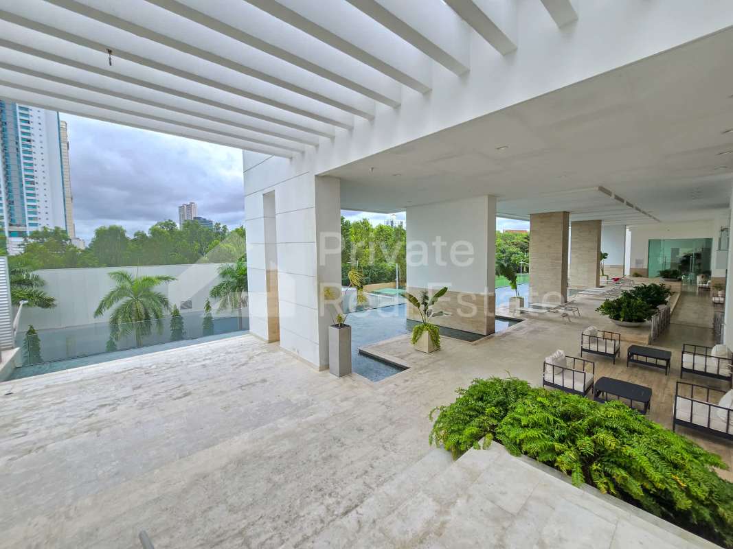Modern infinity pool with lounge area and pergola at PH Aria Costa del Este Panama