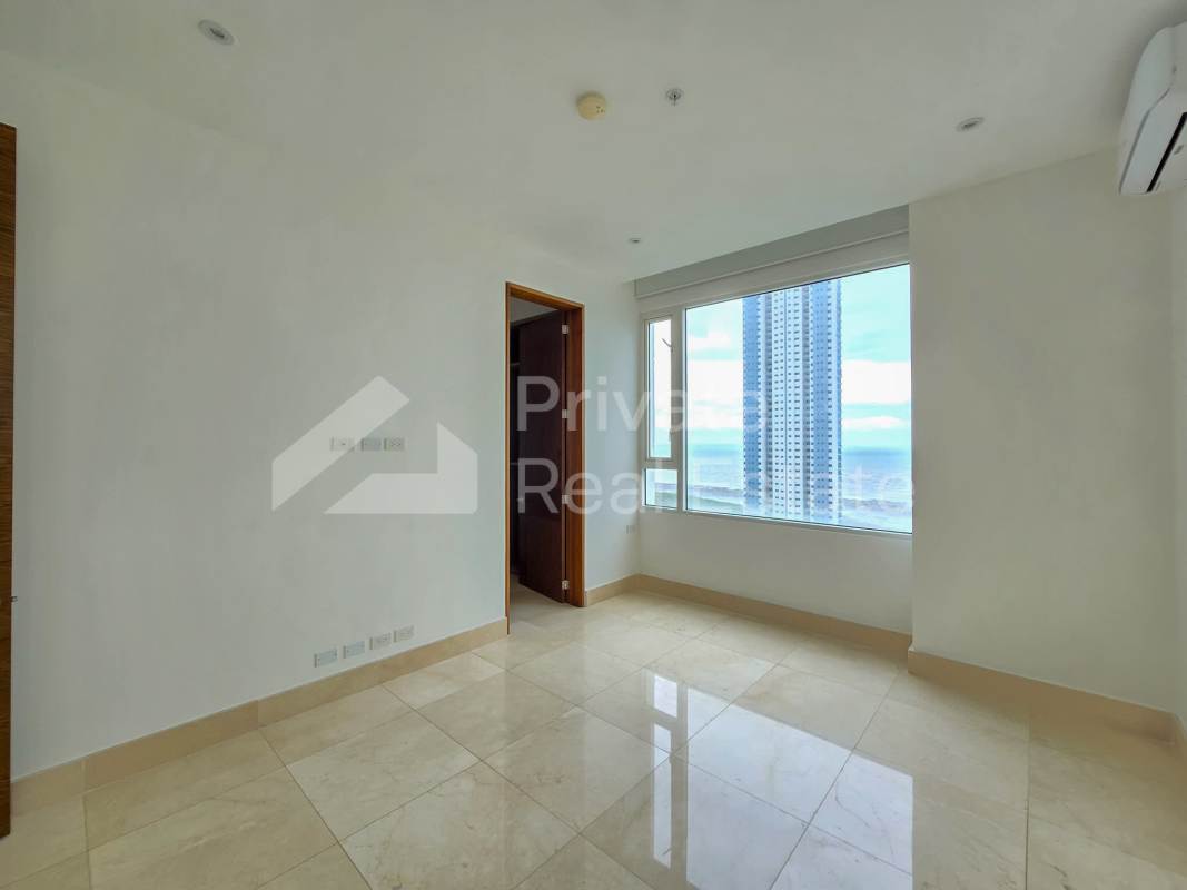 Aerial oceanfront skyline and golf course view of Costa del Este and PH Aria Tower Panama