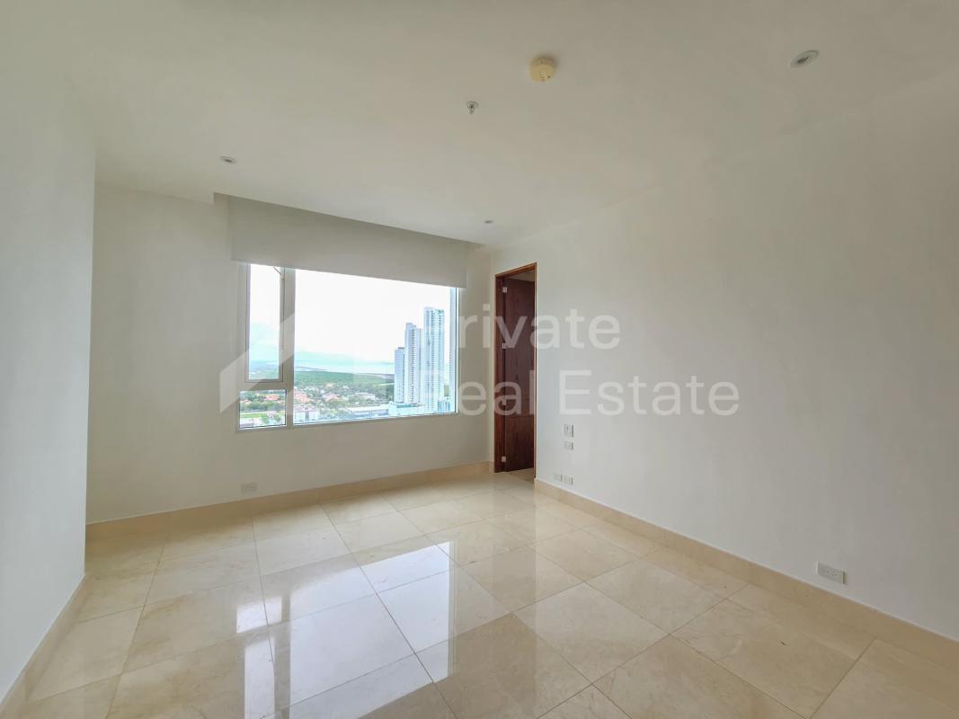 Modern secondary bedroom with large window city view at PH Aria Costa del Este Panama