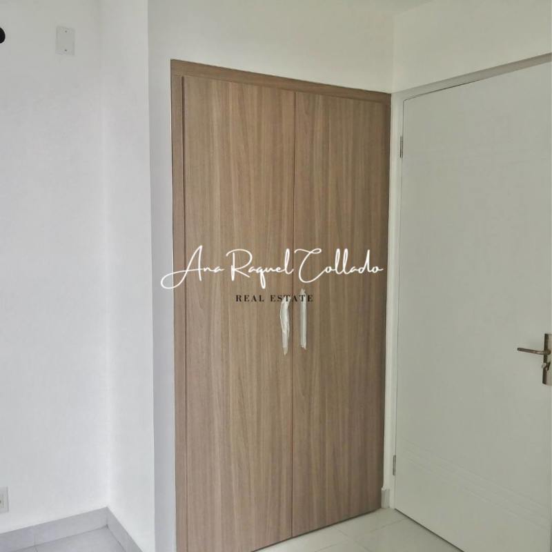 Bedroom with built-in closet and window in PH ILO Panama apartment for sale