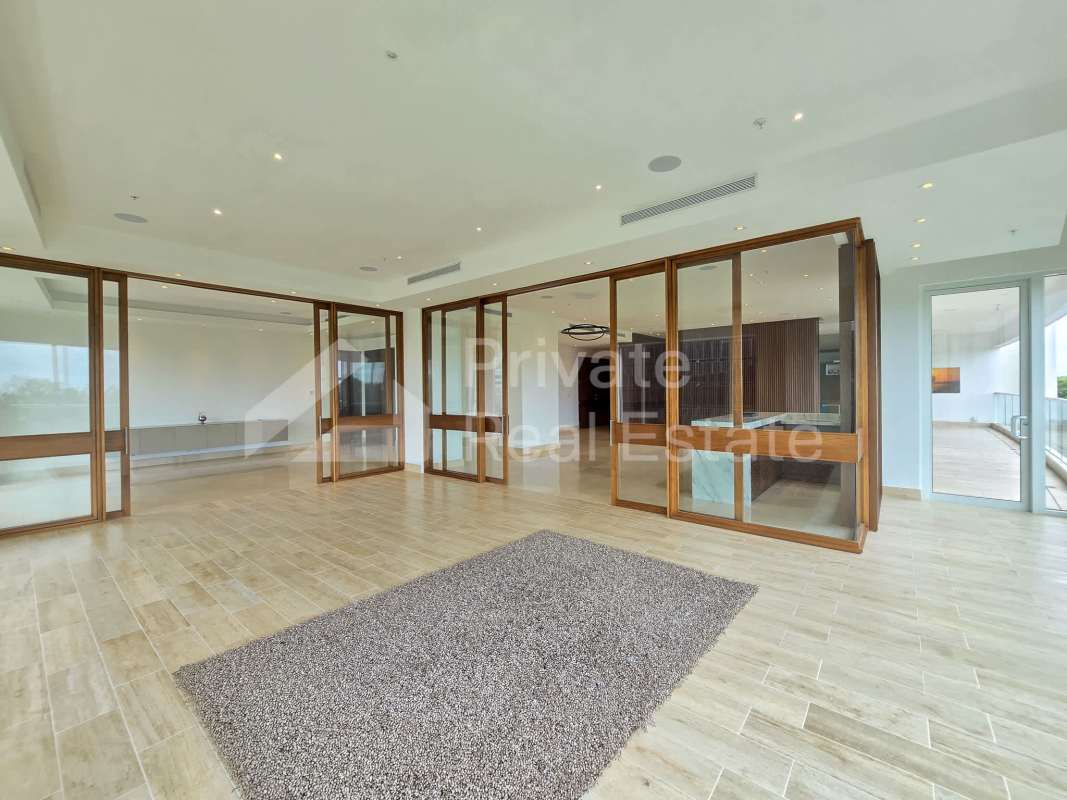 Panorama living dining area with balcony ocean view PH Marea II Panama