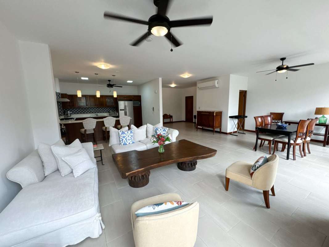 Large open-plan living dining area with French doors balcony PH Star & Herald Casco Viejo Panama