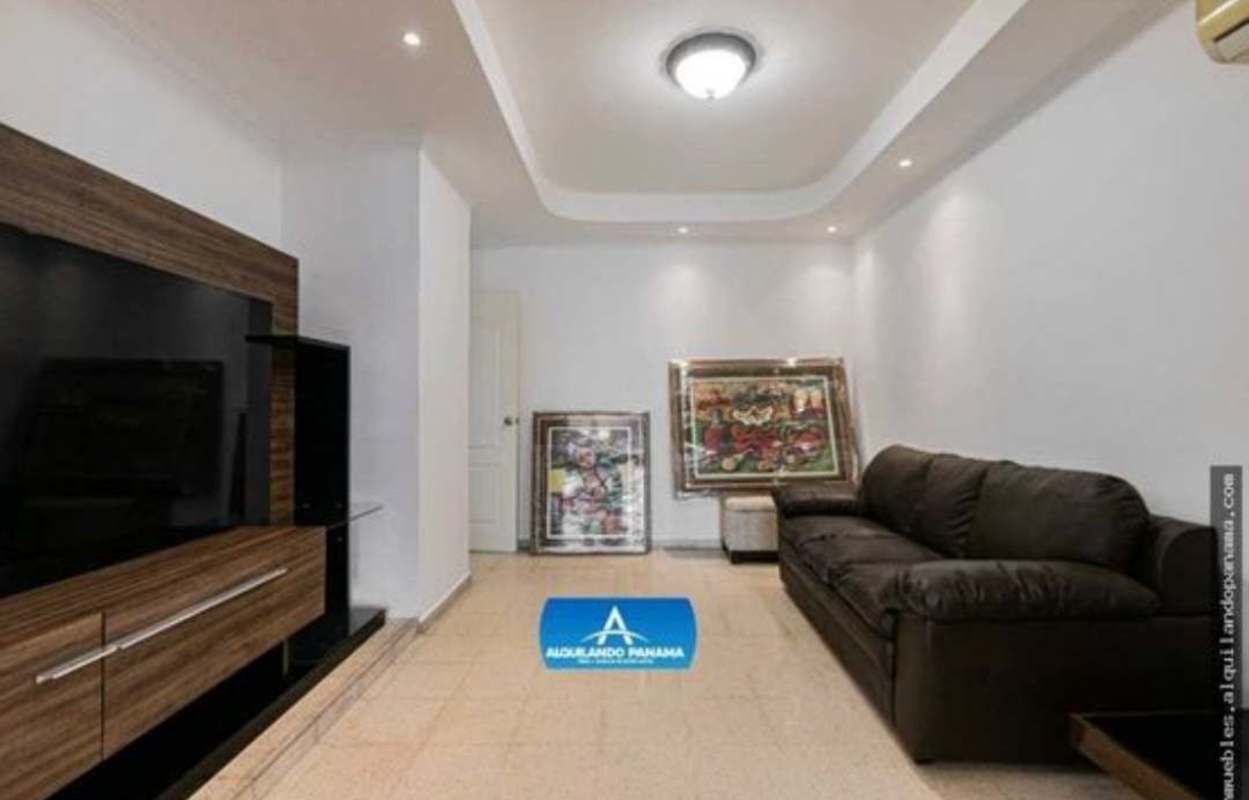 Contemporary living room with sofa, TV area, ceiling lights in Monte Oscuro house San Miguelito Panama