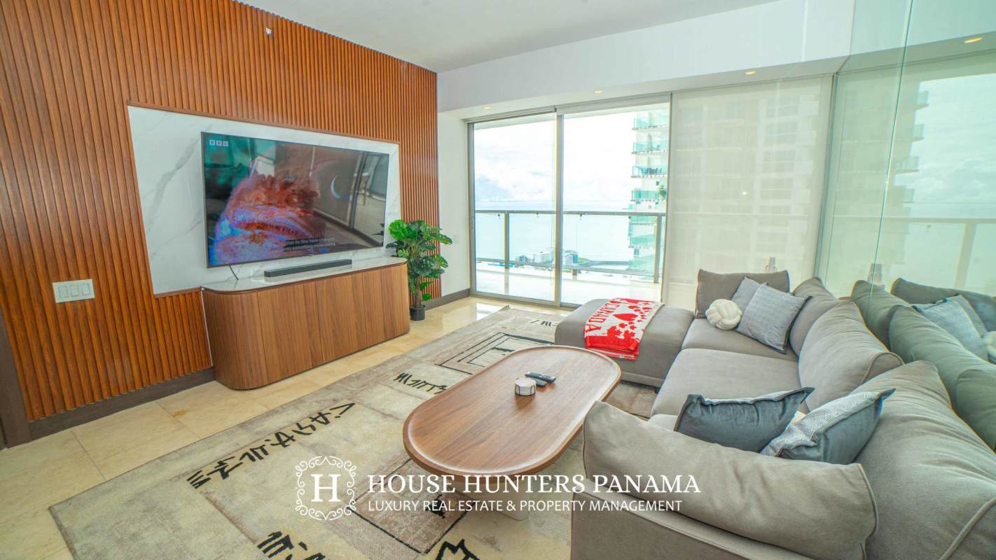 Modern living space open to private balcony and ocean view The Ocean Club Punta Pacifica Panama
