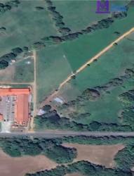 Commercial land aerial near gas station and shops on Las Tablas-Pedasi highway