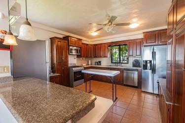Bright bedroom with large windows and ocean view at Malibu Beach property Panama