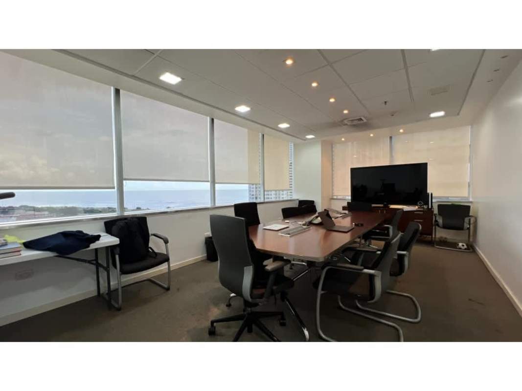 Spacious open-plan office with multiple desks and city panorama in Punta Pacifica Panama