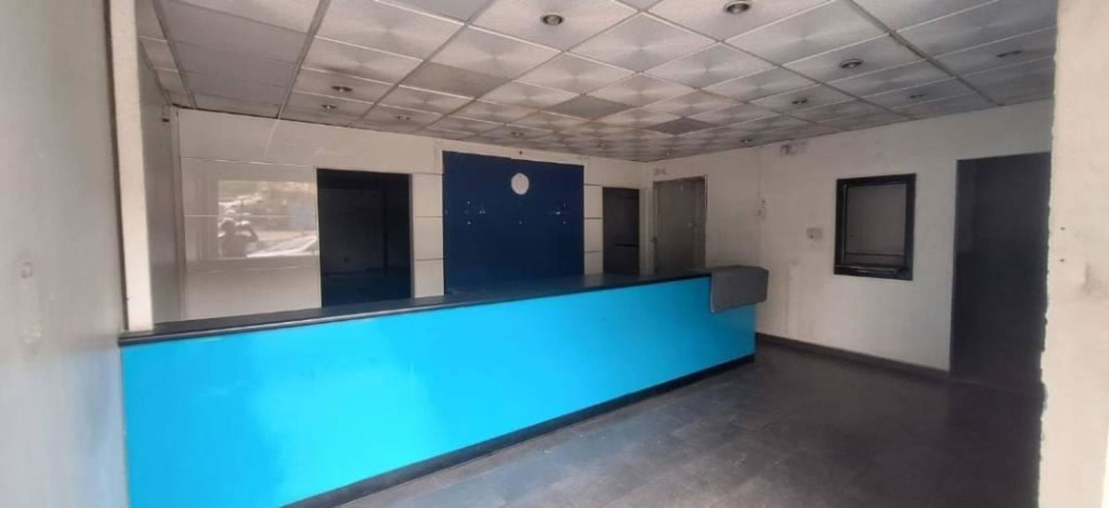 Reception desk area inside commercial warehouse offices for rent Pueblo Nuevo Panama