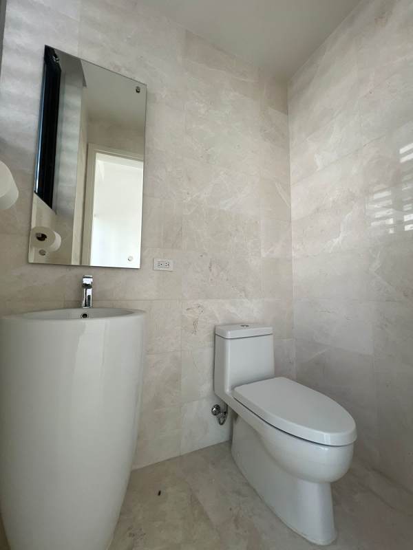 Luxury bathroom with marble tile and modern fixtures in Ocean Reef Islands villa Panama