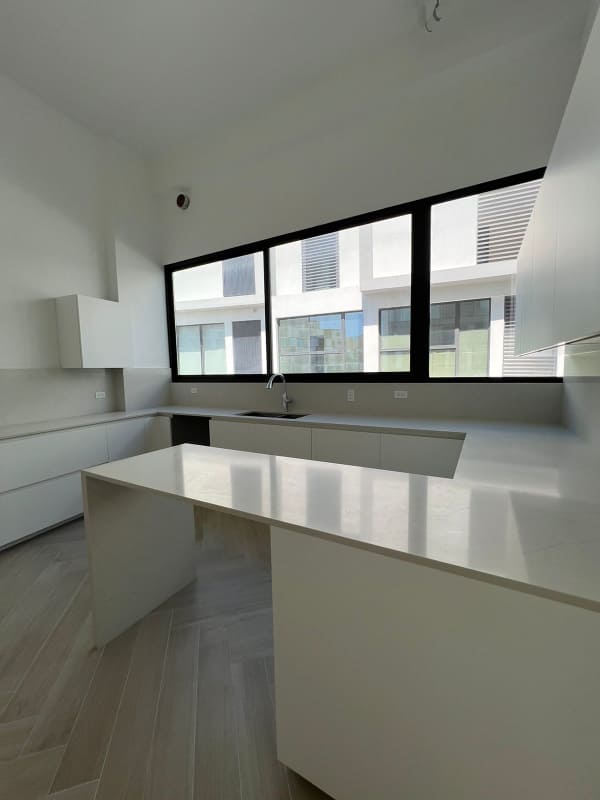 Spacious living room with marble floors, floor-to-ceiling glass and ocean view in Ocean Reef Panama