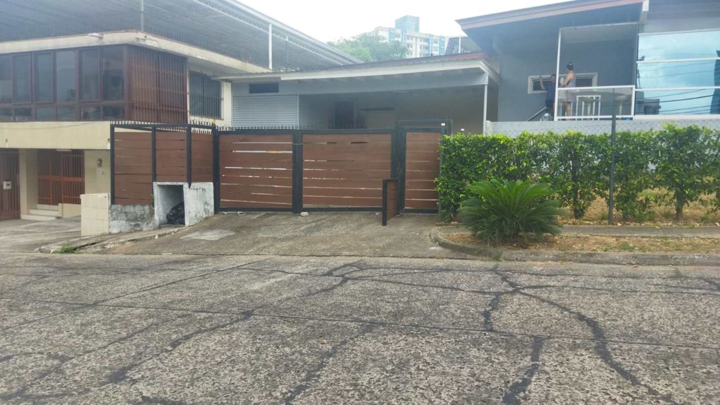 Industrial style storage room with metal shelves concrete floor in commercial building Panama
