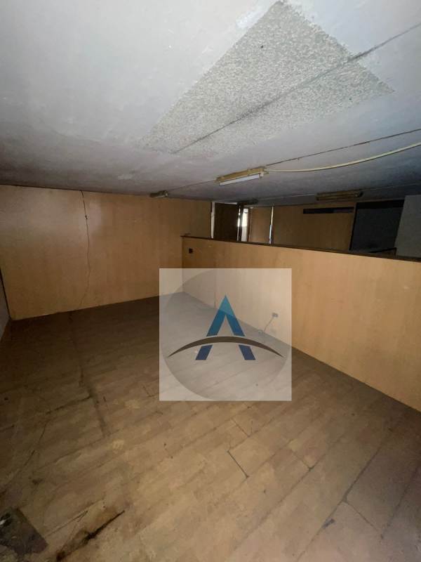 Unfinished commercial storage or utility room with wood panels Panama City Via España