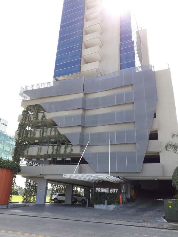 Modern multi-story glass facade office tower Prime 507 Santa María Panama for rent