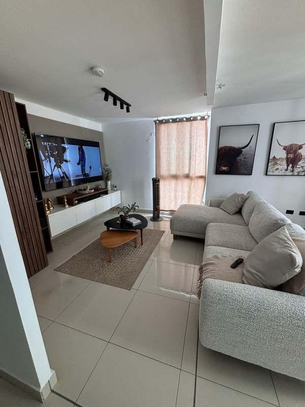 Spacious living room with modern furnishings and wall-mounted TV PH Carrasquilla Park Towers Panama