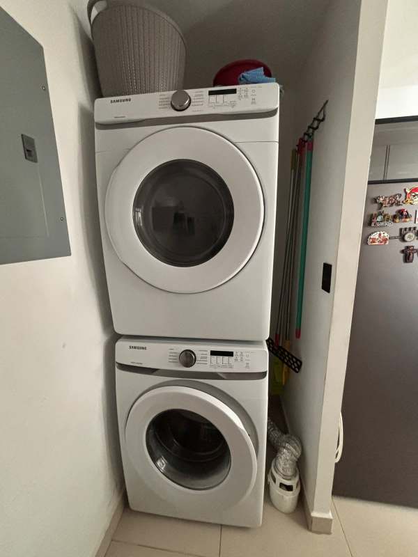 Secondary bathroom with granite vanity and glass shower enclosure PH Carrasquilla Park Towers Panama