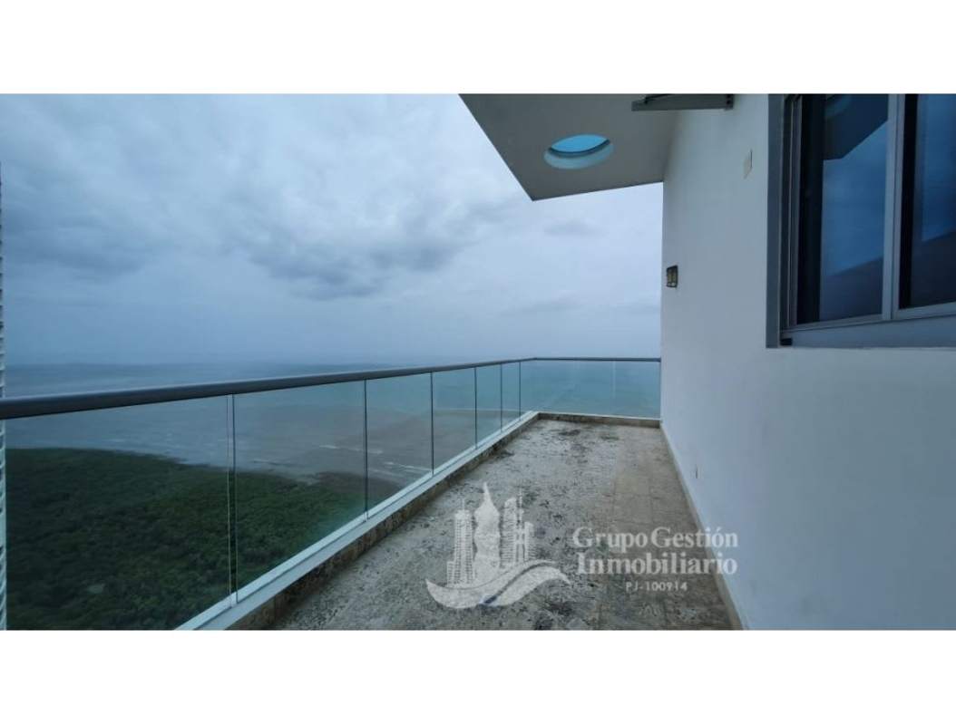 Spacious bedroom with wood floors and ocean view windows in Costa del Este penthouse