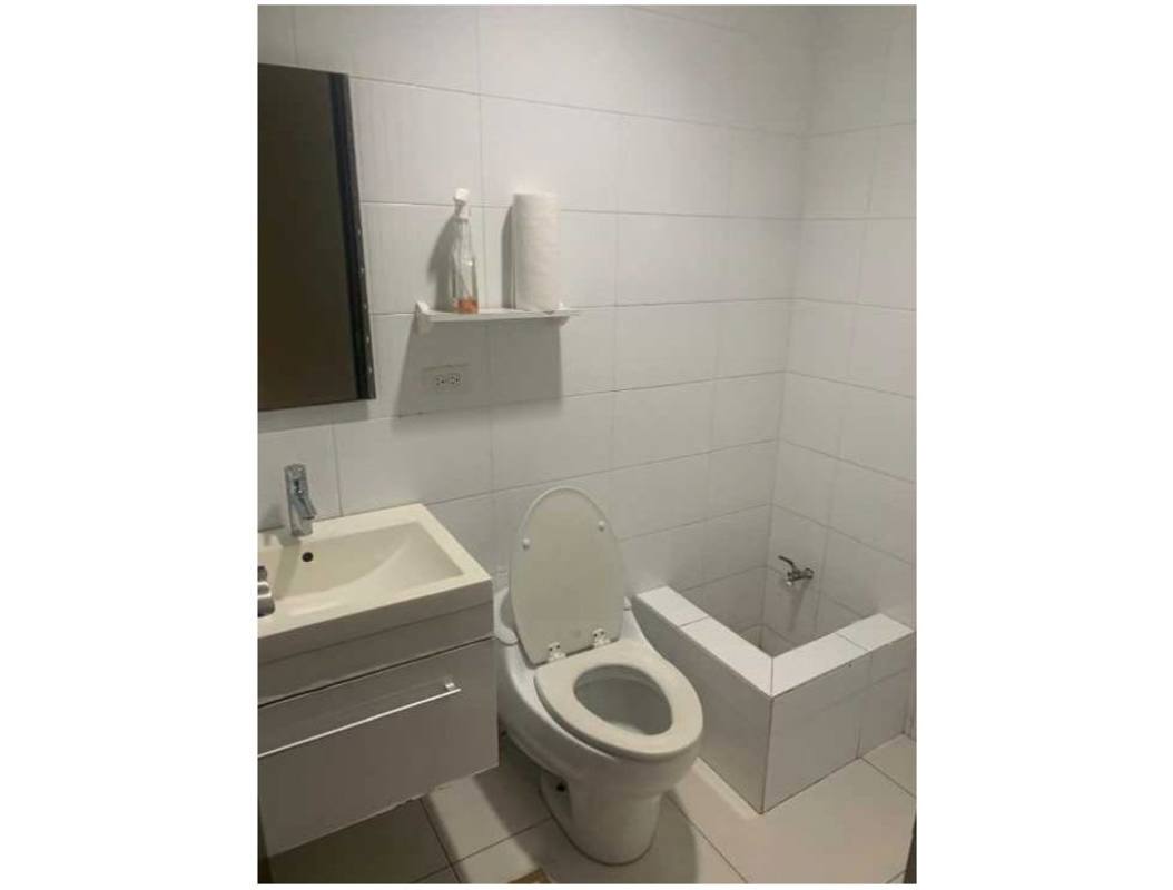 Glass facade commercial retail below modern offices PH Top Tower Costa del Este Panama