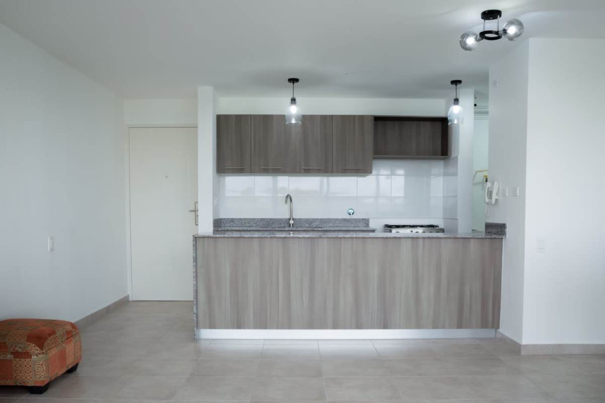 Dining space next to large windows access to balcony at PH Hacienda Golf Brisas del Golf Panama