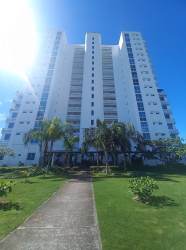 Modern high-rise building with balconies at Playa Blanca Panama beachfront community