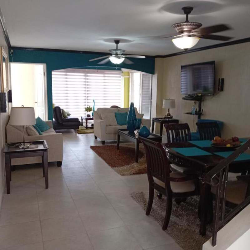 Furnished lounge dining with ceiling fans, neutral tones in Brisas del Golf Panama