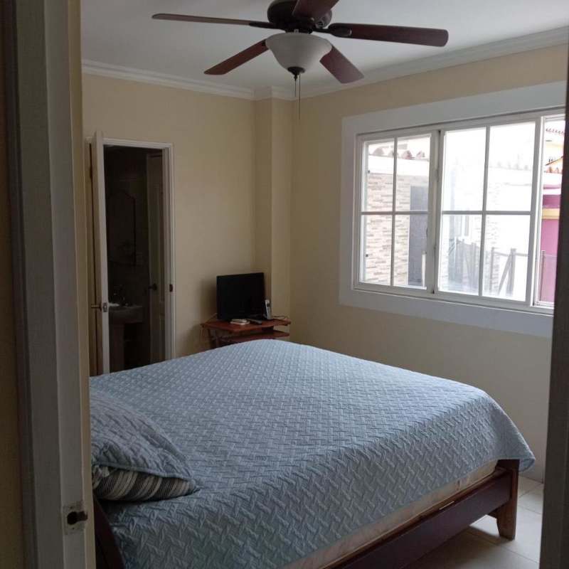 Bedroom with ensuite bath, ceiling fan, natural light Brisas del Golf Panama City