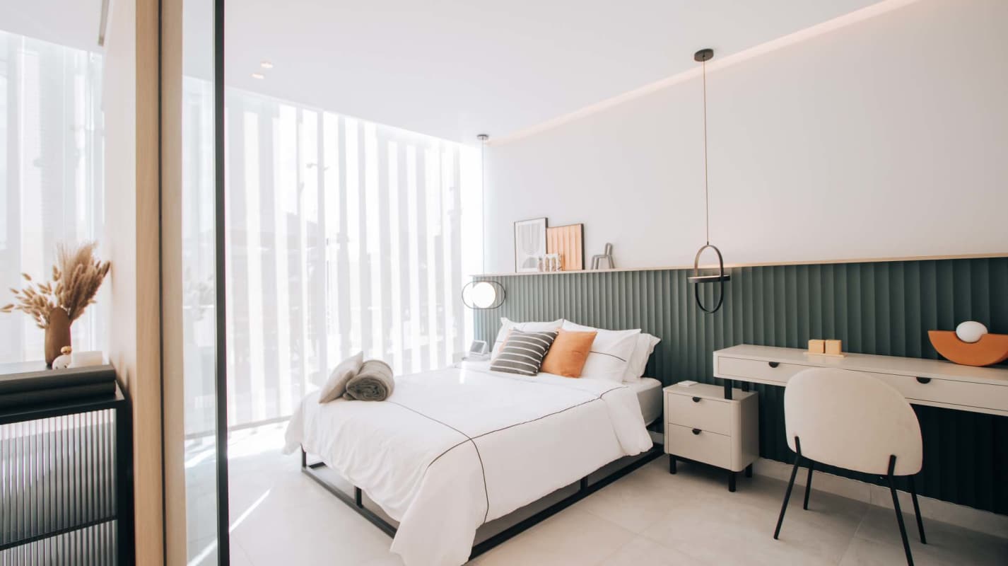 Built-in modern closet cabinetry inside Generation Tower Costa del Este condo-suite