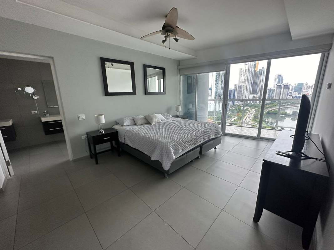 Kitchen with island, stainless appliances and bay view windows at PH BICSA Tower Panama