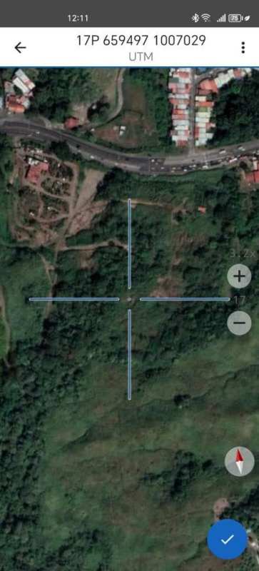 Satellite image aerial perspective of large vacant 10,000m² lot with frontage on Transistmica Avenue in Las Cumbres Panama