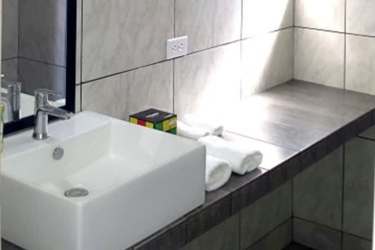 Granite countertop kitchen with wooden cabinets oceanfront villa Playa Corona Panama for sale