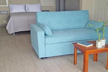 Casita Del Mar beachfront guest cottage terrace with ocean panorama Playa Corona sale Hola Realty