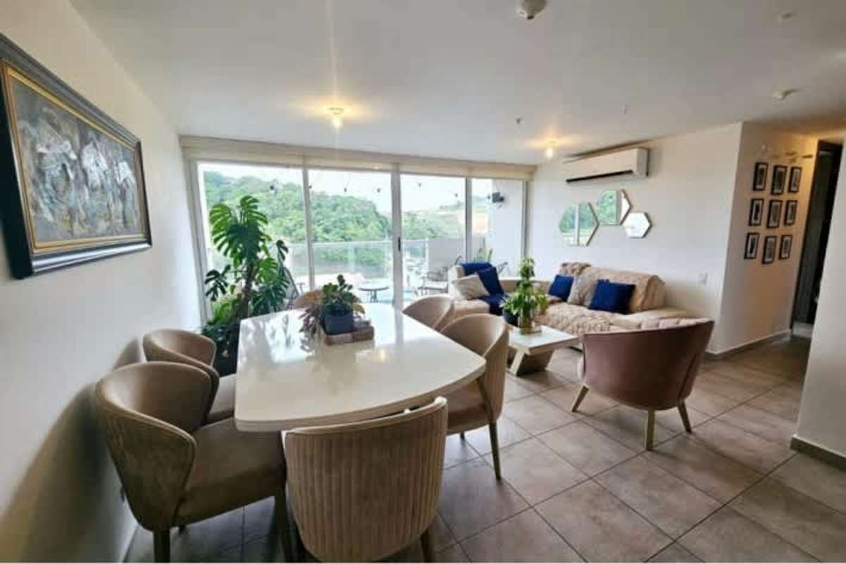 Well-lit bedroom with AC outlet, closet and tiled flooring in PH Hacienda Golf Brisas del Golf Panama