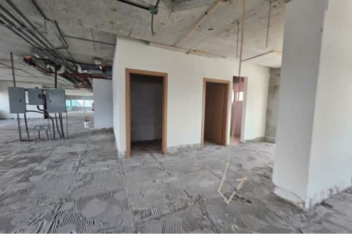 Corner office shell with floor-to-ceiling windows panoramic view Santa María Business District