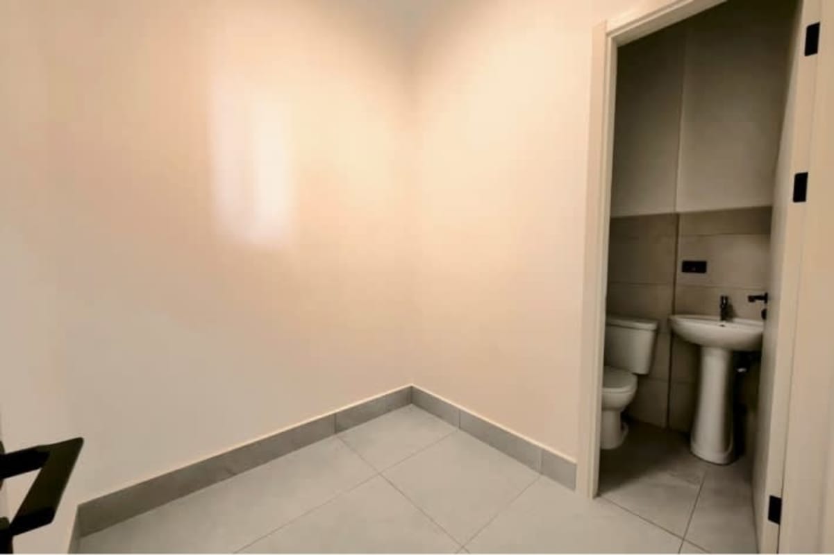 Living and dining area with natural light and city views Aquapoint Punta Paitilla Panama