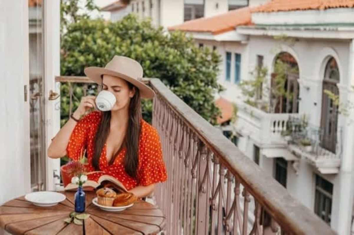 Terrace lounge area with potted plants waterfront skyline view Casco Viejo Las Clementinas Panama