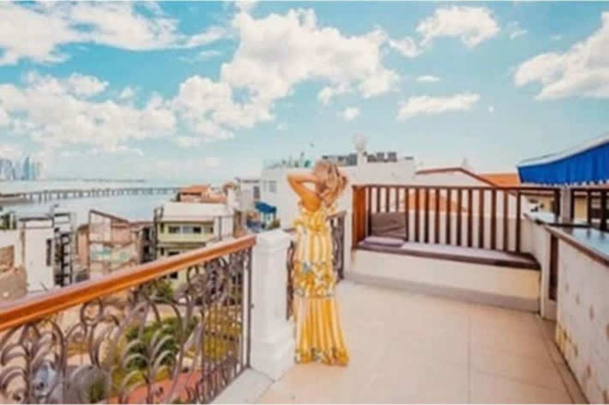 Rooftop terrace with Panama City ocean and skyline panoramic view Las Clementinas Casco Viejo Panama
