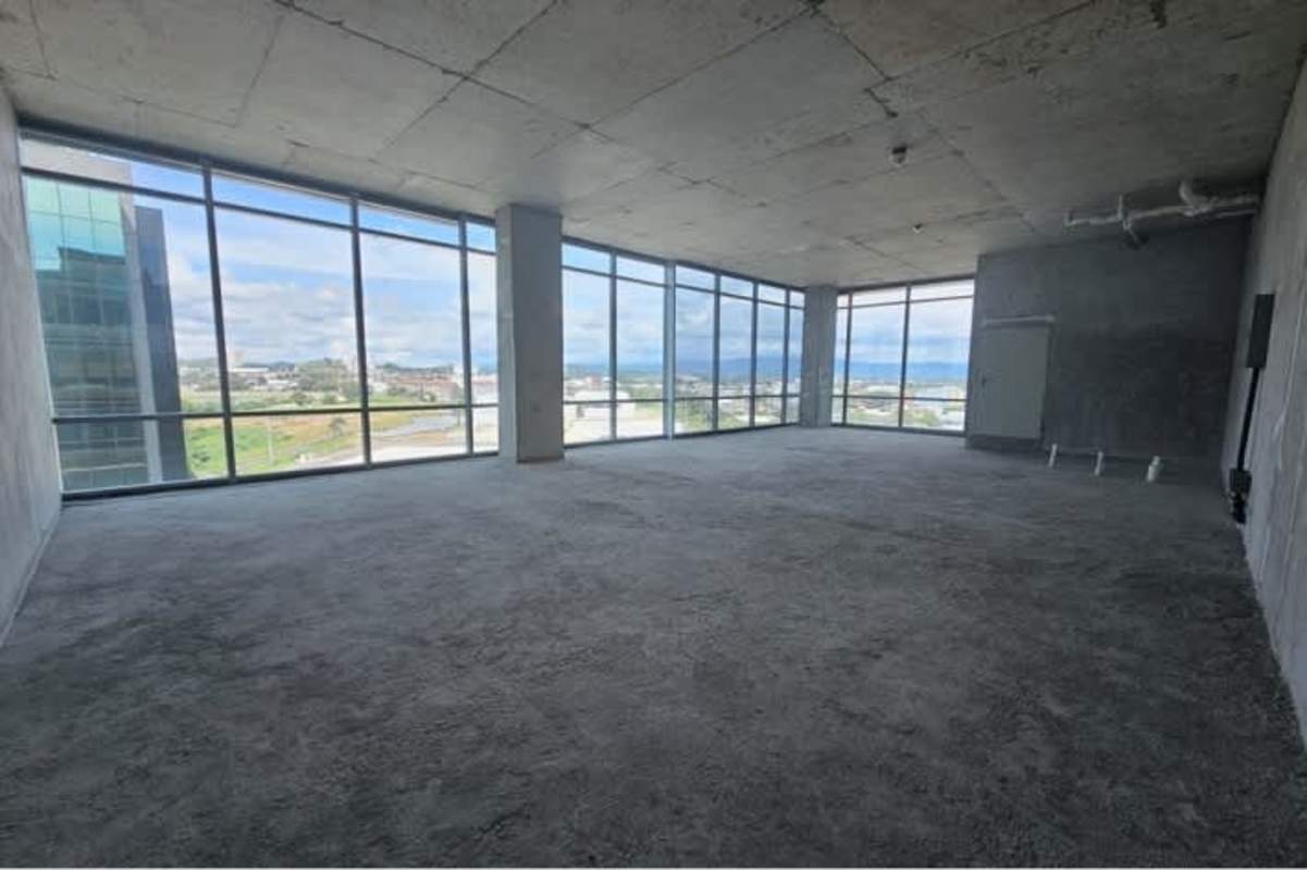 Unfinished modern office with glass walls panoramic city views in Santa María Business District