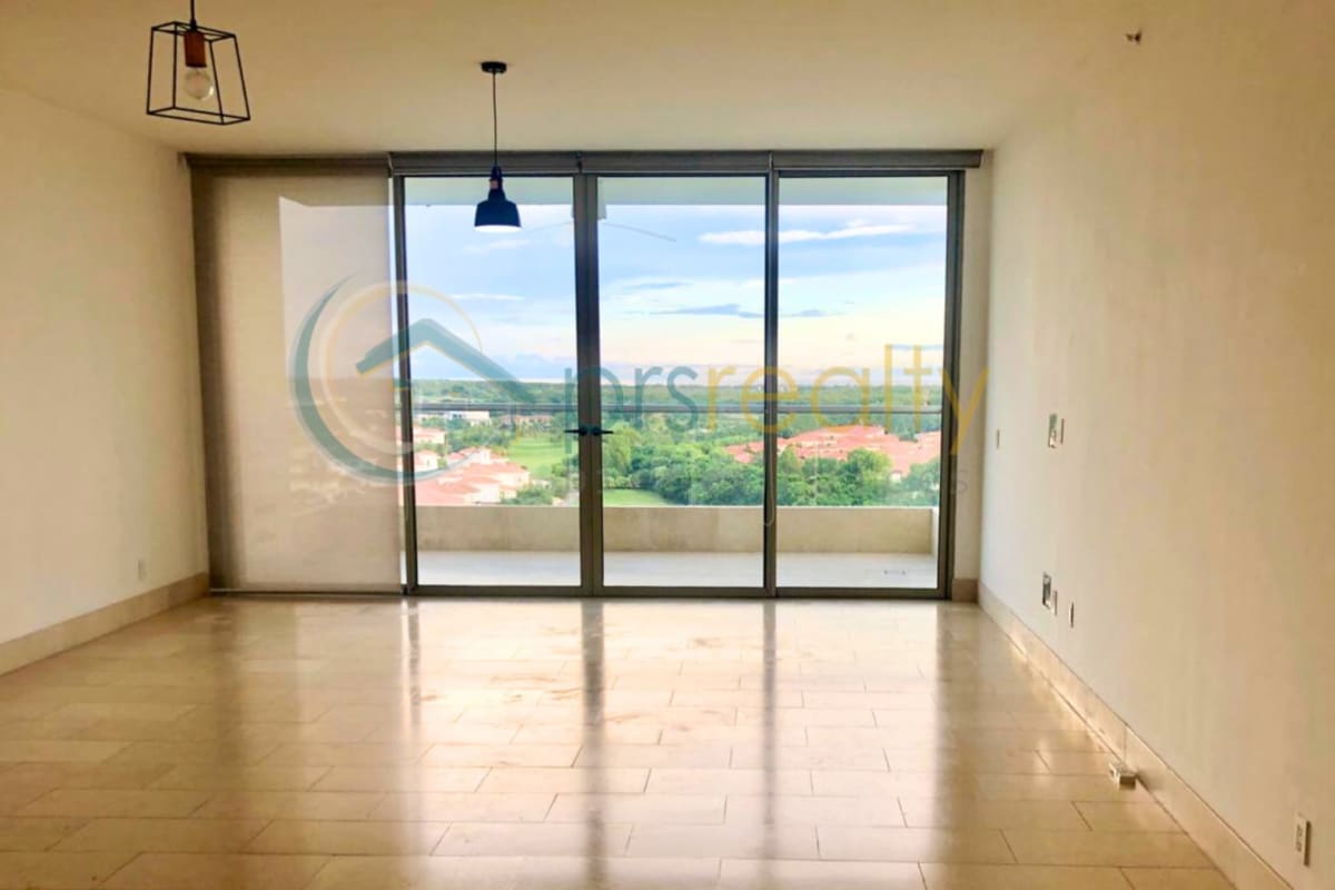 Apartment hallway with multiple doors, neutral tile flooring in PH Greenview Santa Maria Panama