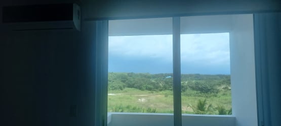 Bedroom or living room large sliding window ocean balcony Playa Blanca Panama