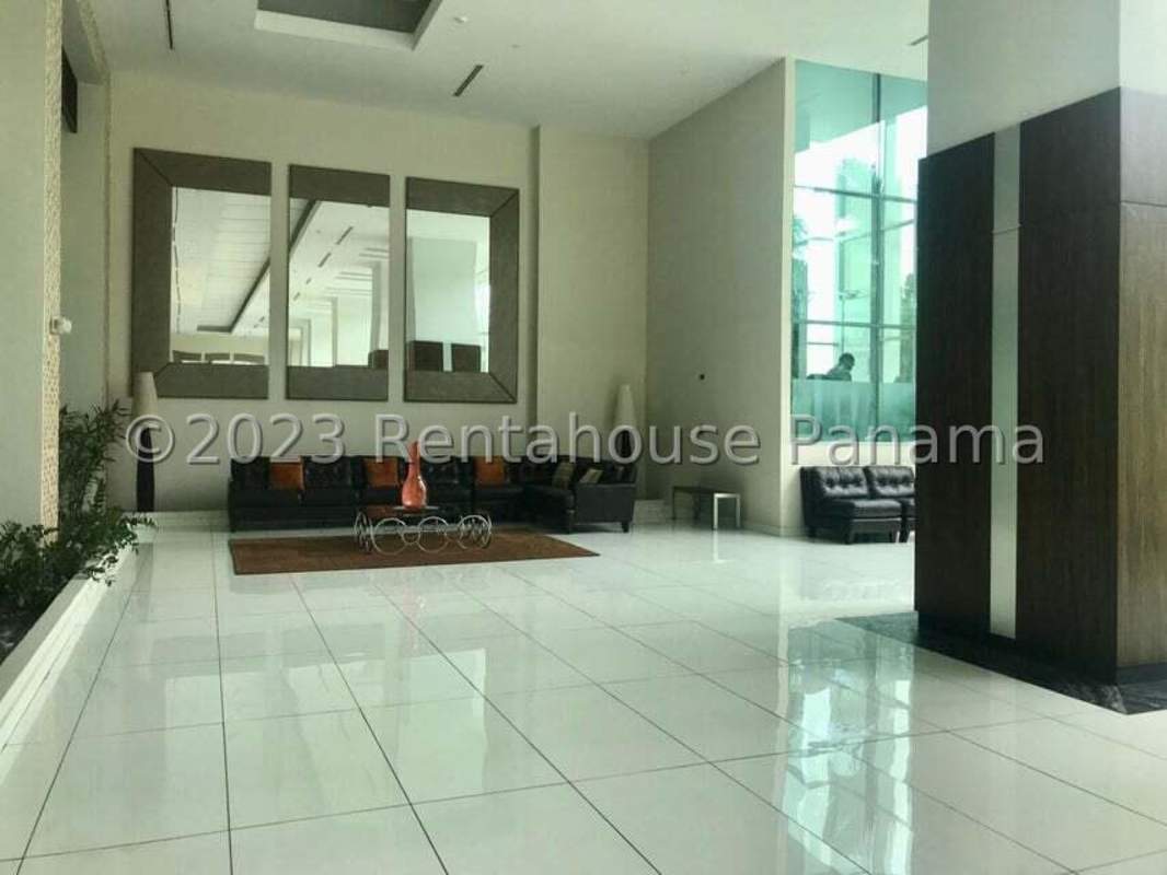 Modern grand lobby with marble and glass design at PH Ocean Two luxury tower in Costa del Este Panama City