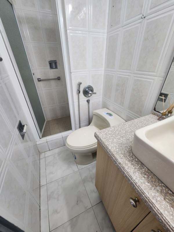 Spacious living dining room with tile floor, balcony access, ocean view Punta Paitilla Panama