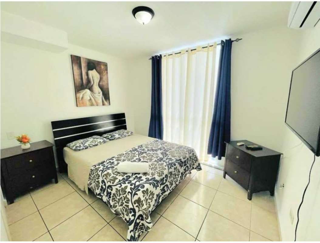 Modern furnished apartment open layout living dining PH Sunshine Carrasquilla Panama City