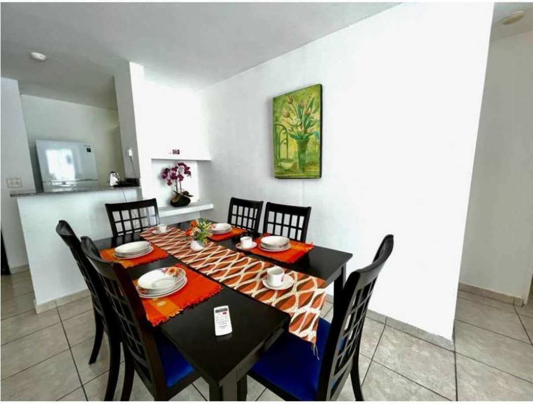 Compact galley kitchen with granite counters PH Sunshine Carrasquilla Panama City