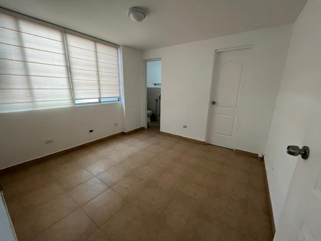 Bedroom including split AC unit, large closet and tile floors in PH Paseo del Golf